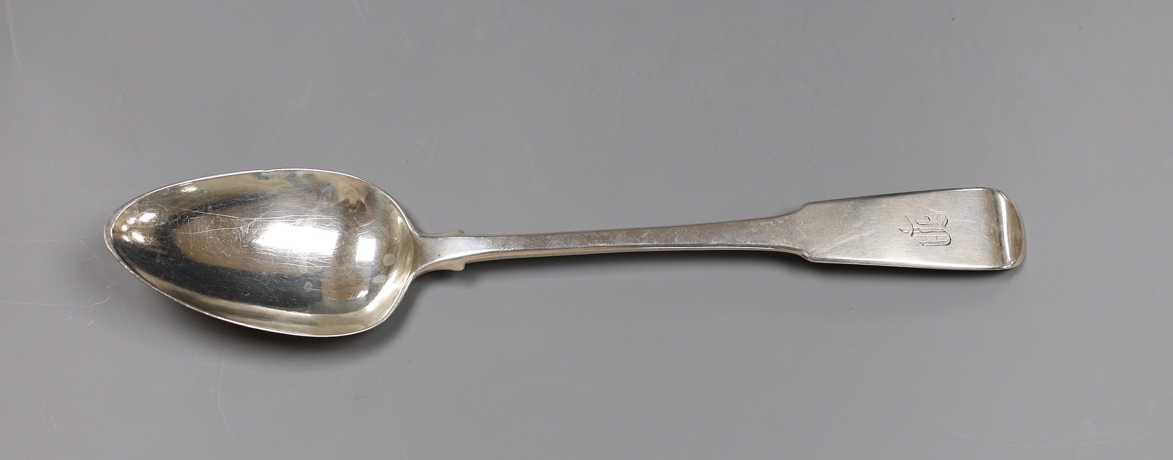 A George III silver fiddle pattern basting spoon, initialled P, London 1821, 4.5 oz.